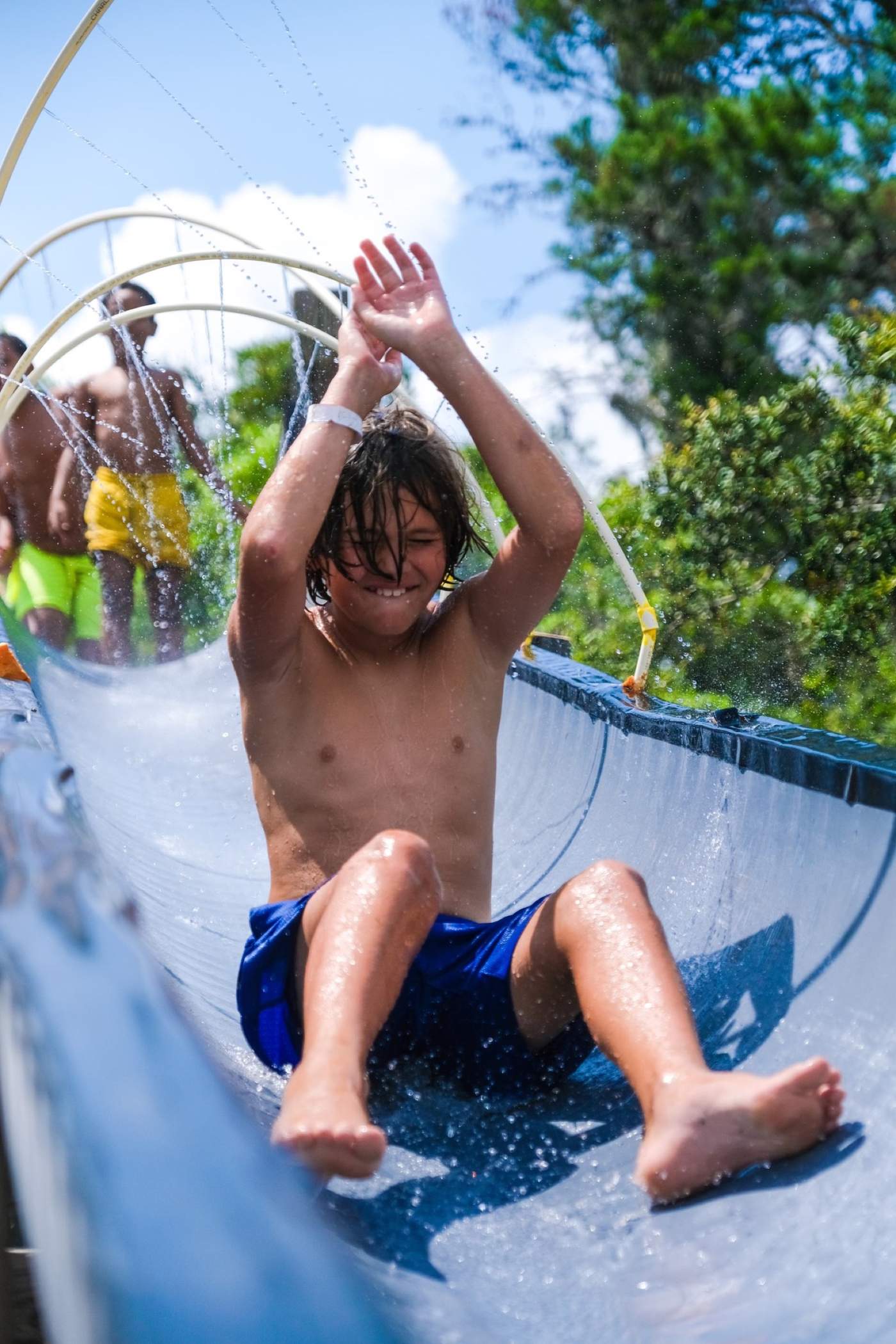 Water slide fun at Camp Osprey